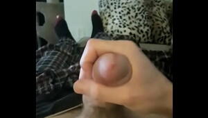 Horny dude strokes big white cock slowly