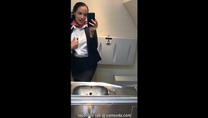 latina stewardess joins the getting off mile high club in the lavatory and cums