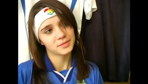 Gals from argentina and italy football uniforms have a nice time at the locker room