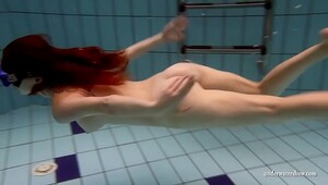 Big tits brunette Mia underwater naked