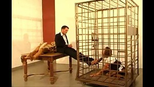 German assistant woman licks feet and bj's cock of her boss in cage