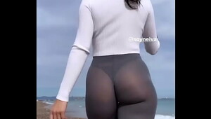 Sexy Latina walking in see through leggings