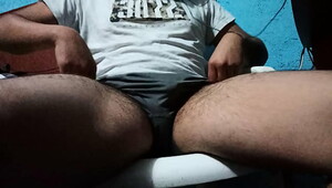 Youthful hot boy and his dick out of shorts