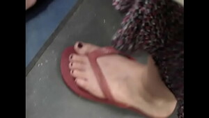 Little blonde feet in havaianas on bus 2