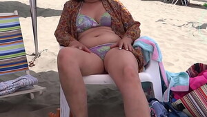 Opening Part - My 58 year old hairy wife shows off in bikini on the beach, masturbates, wants to fuck, intense orgasms, cum on tits and hairy pussy