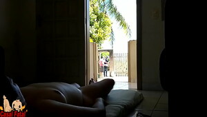 Wife takes a sunbath and displays her nude assets to delivery man